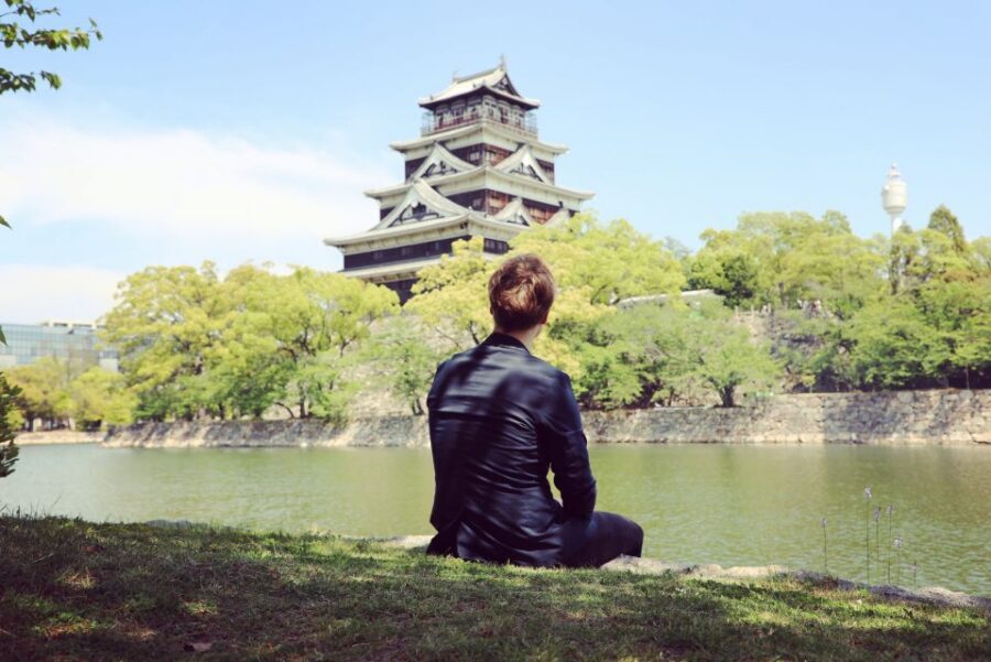 Hiroshima: Hidden Gems and Highlights Private Walking Tour - Eating like locals: okonomiyaki, oysters, sake, and curry cravings